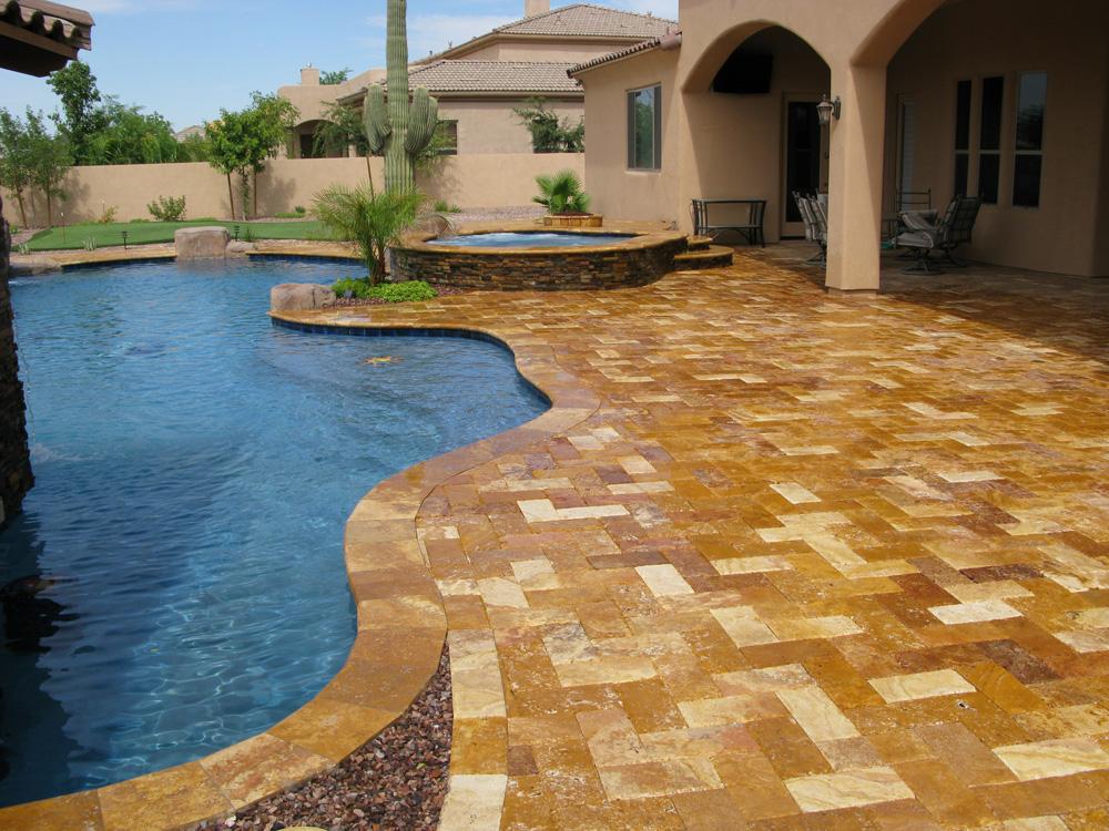 Curved walkway with landscape lighting and plantings